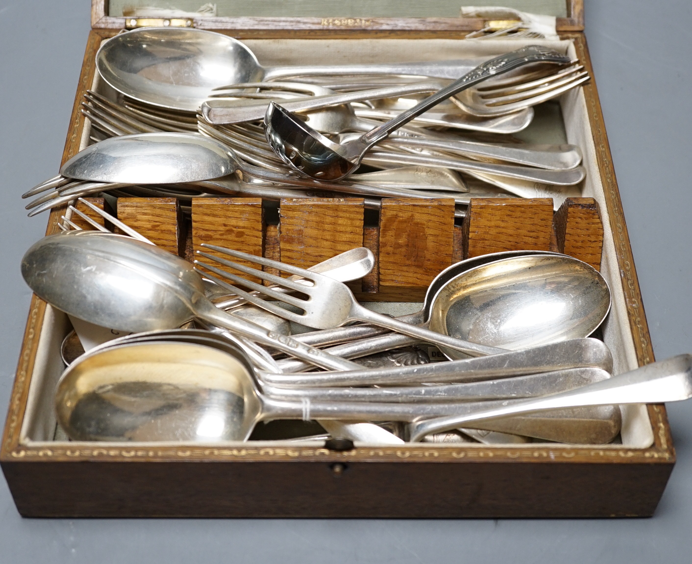 A part canteen of late Victorian silver rat tail pattern flatware, London, 1897, two other silver items of flatware and two plated items
